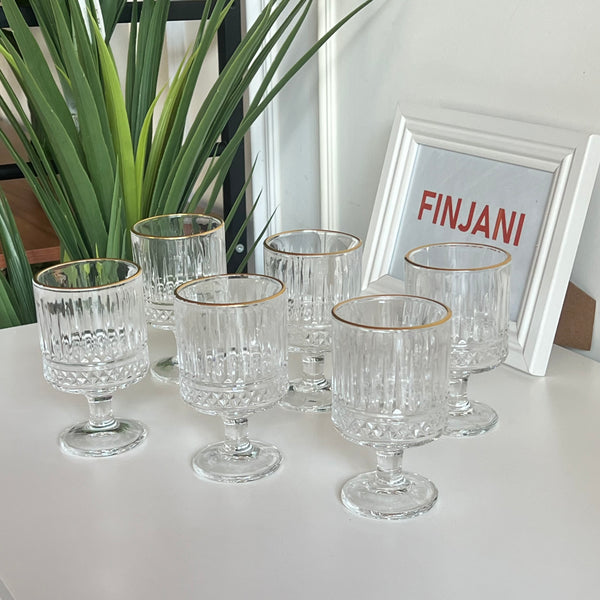 طقم كاسات عصير شفاف محزز ذهبي